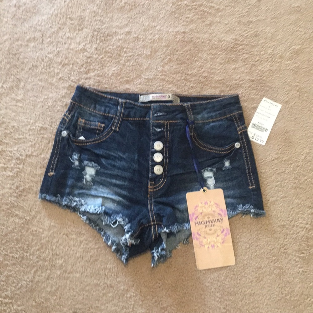 High waisted, distressed shorts
